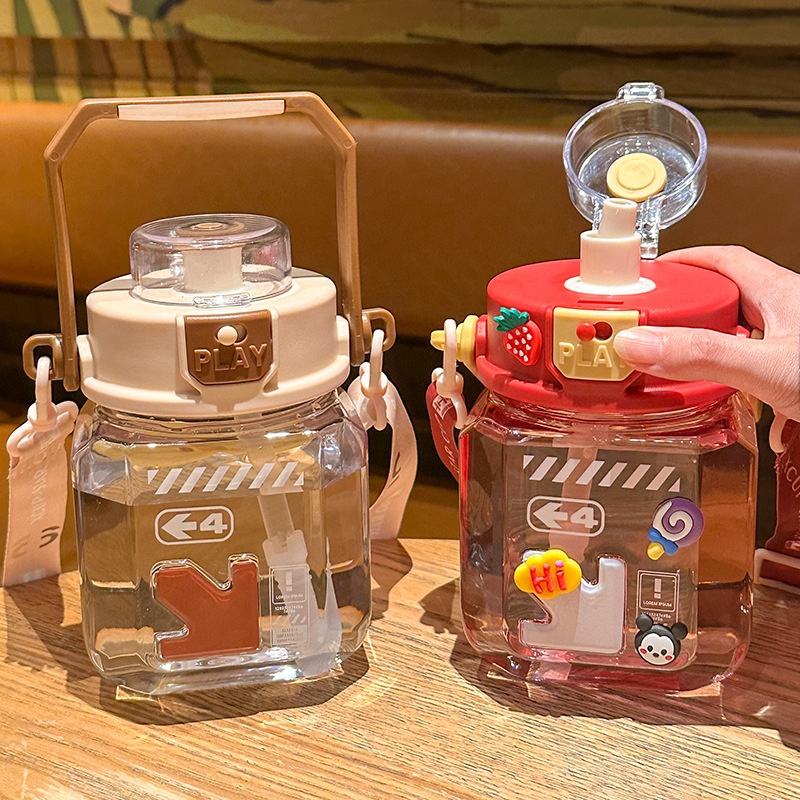 Children's Portable Sports Cute Handle Water Bottle With Pop-up Lid & Lock - 1100 Ml - Random Color - Project M Shop