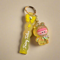 Yellow Fairy Tales Acrylic Keychain – Golden Storybook Charm